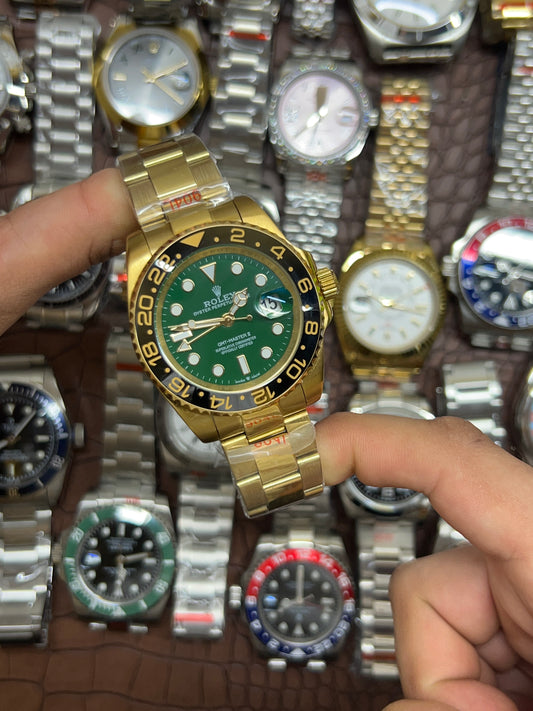 Gmt oro con quadrante verde